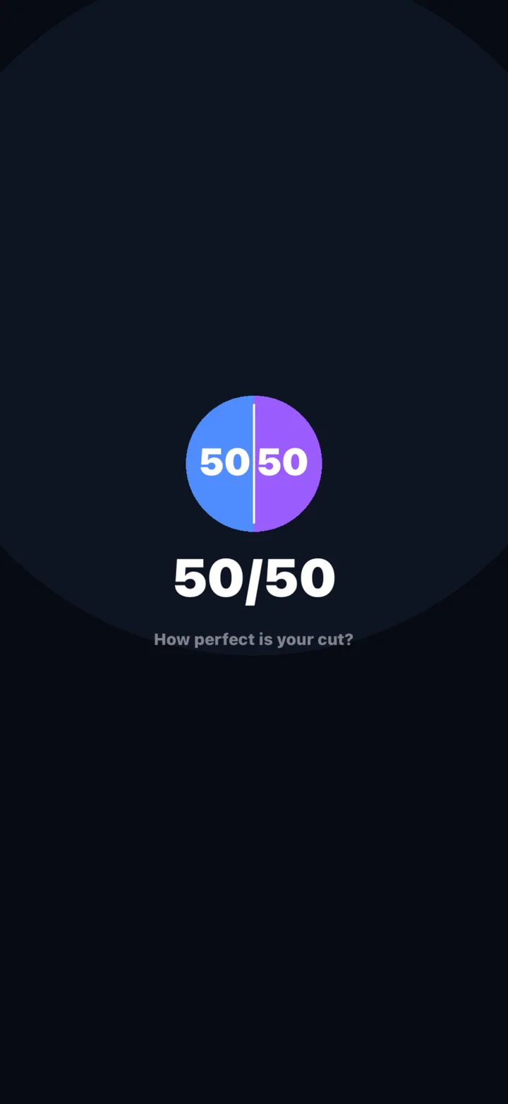The 50/50 title screen: a circle split down the middle, blue on the left and purple on the right, reading 50 | 50.